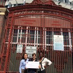 Manuela, Dr. Jenni Buckley, and Amira (L to R) accept Chevron's generous donation of $100,000 to The Perry Initiative